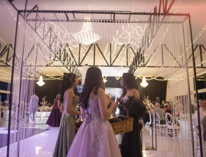 Guests celebrating under hanging crystal light features