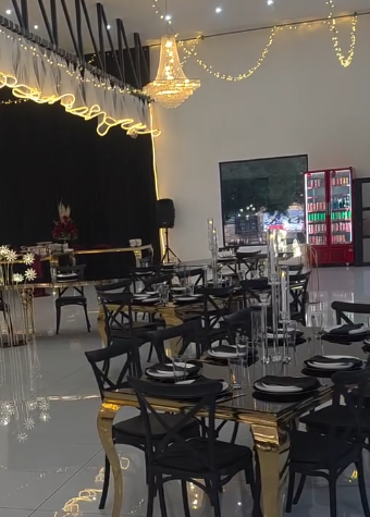 Black draped hall set for an evening reception