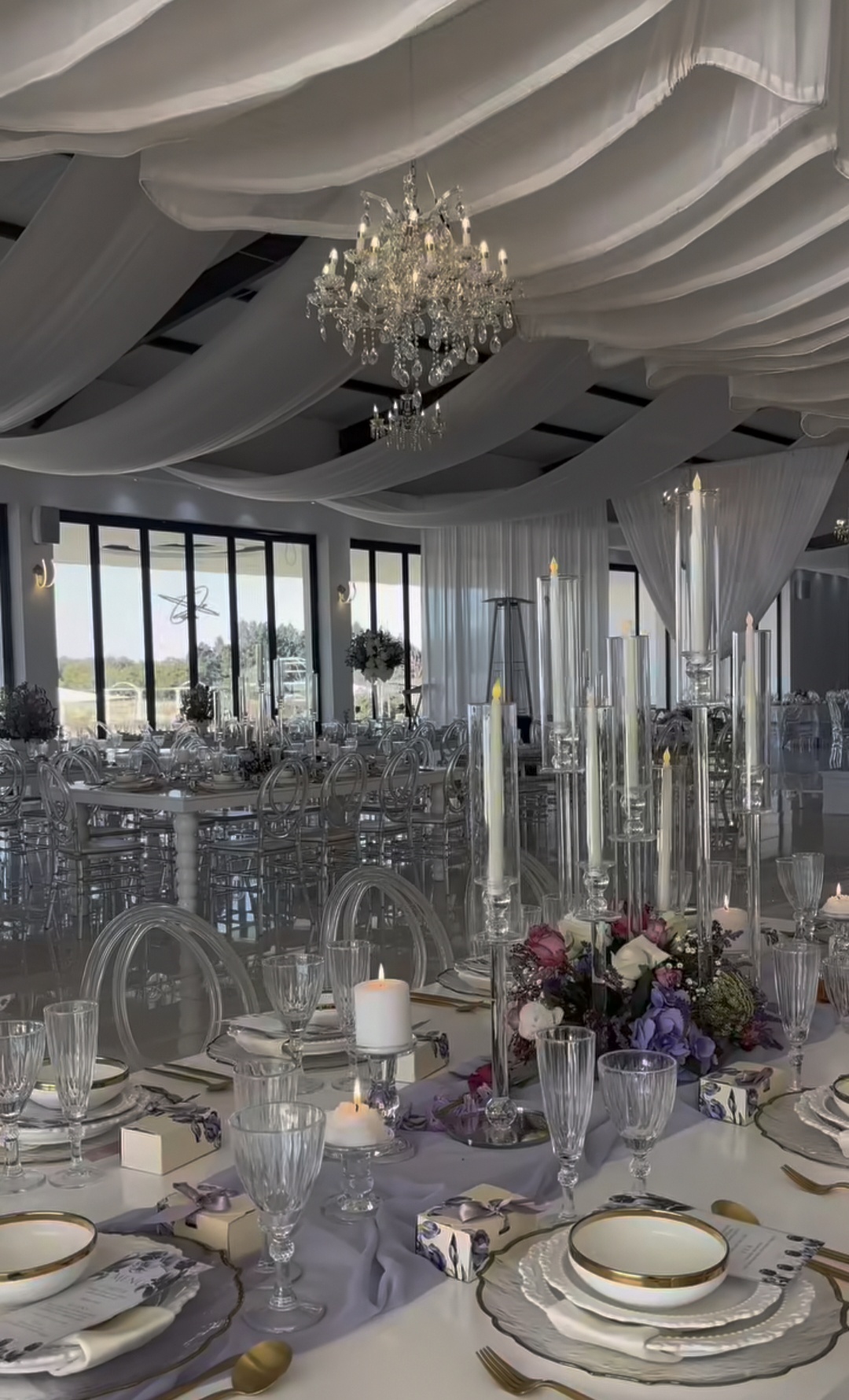 Lilac tablescape with tall glass candelabras