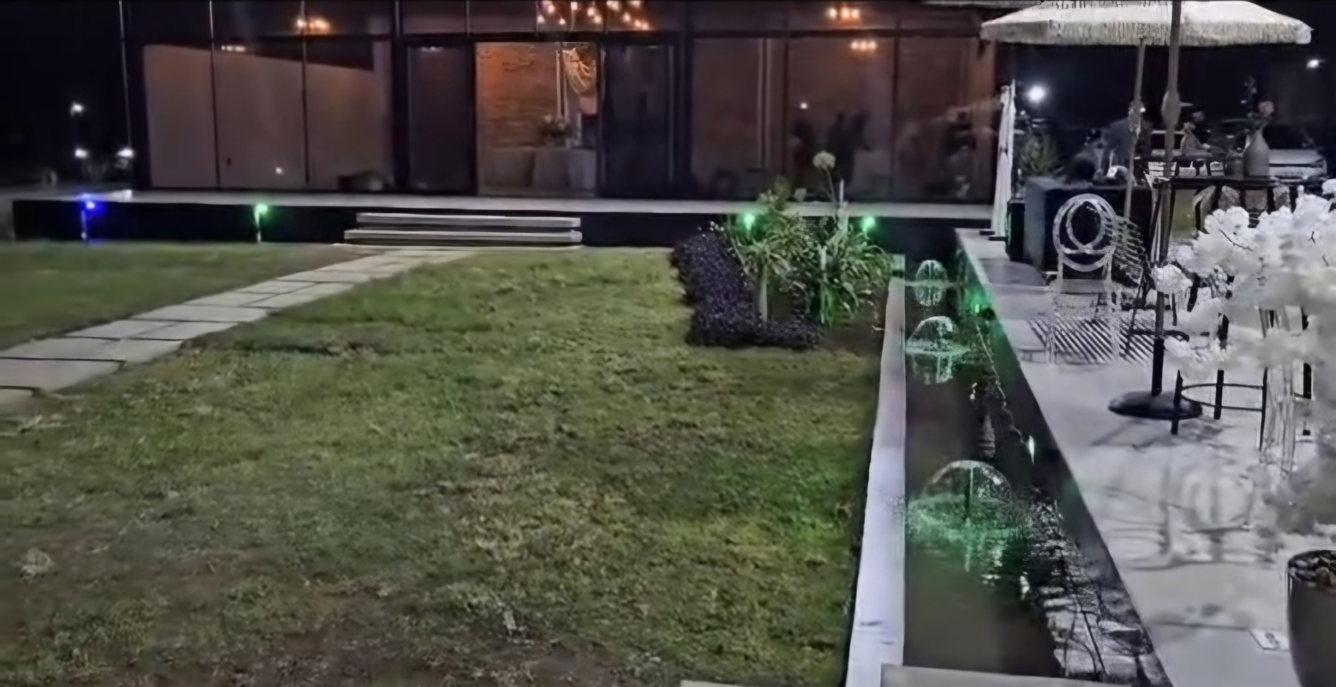 Garden water feature at night