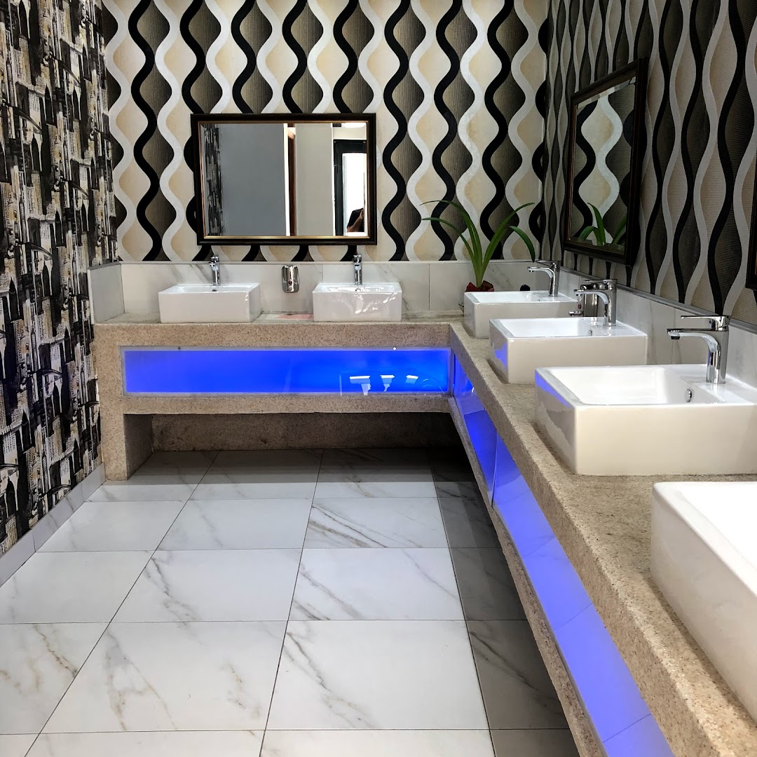 Marble guest bathroom with ambient lighting