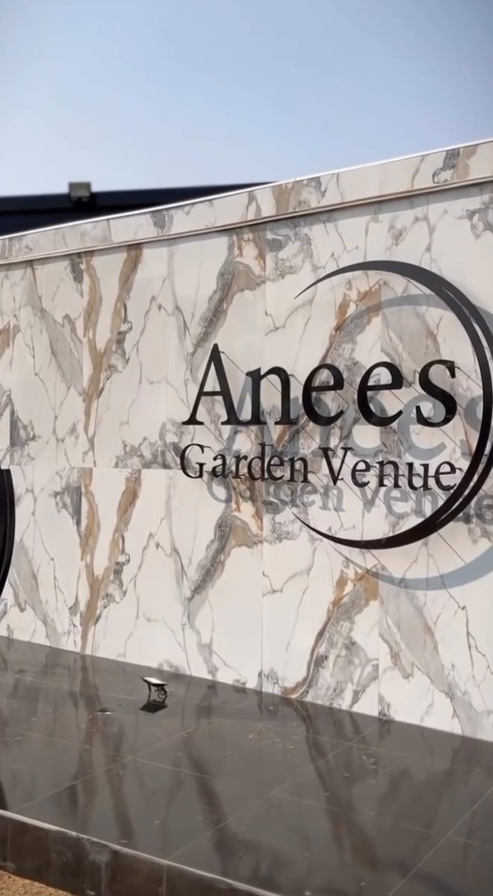Marble signage wall at the entrance