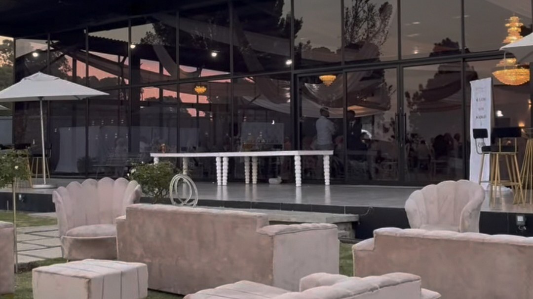 Blush lounge seating on the lawn at sunset