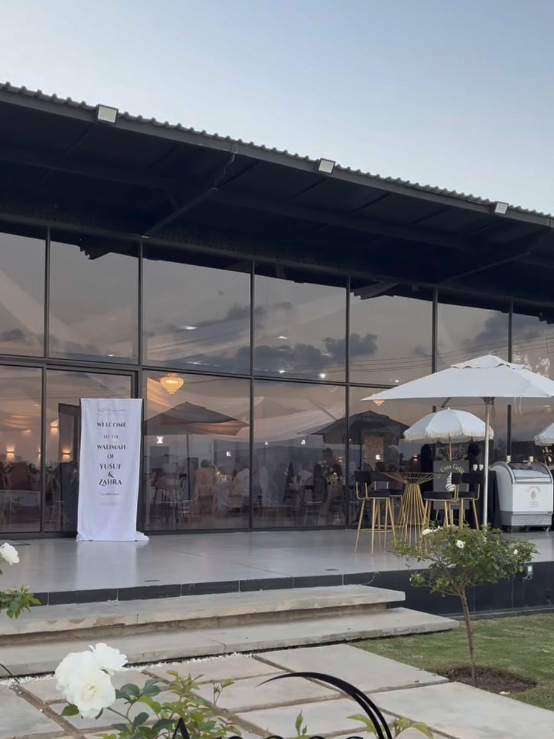 Anees Garden Venue exterior with garden umbrellas