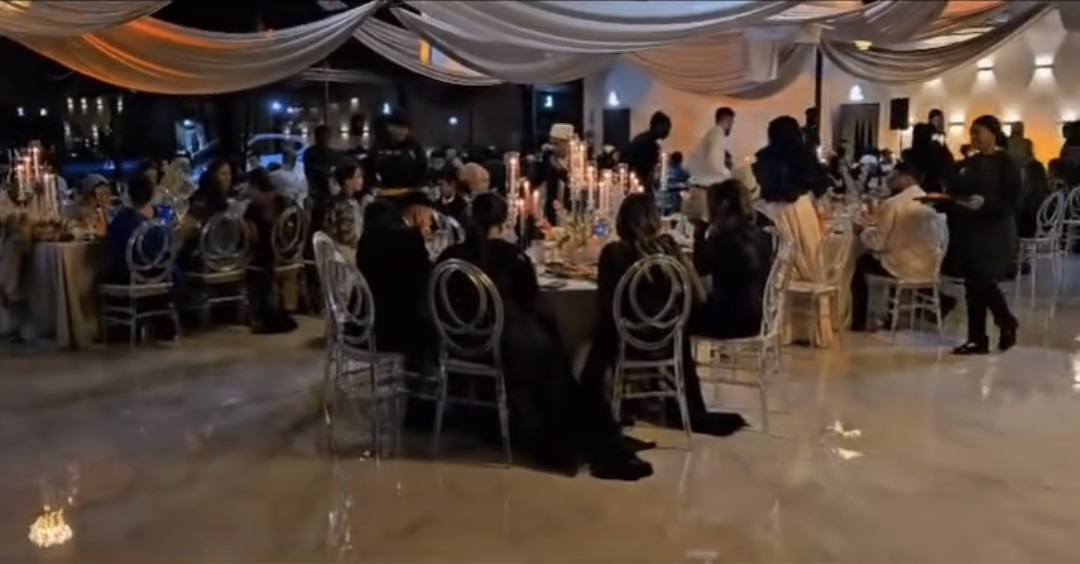 Evening reception with candelabra tables